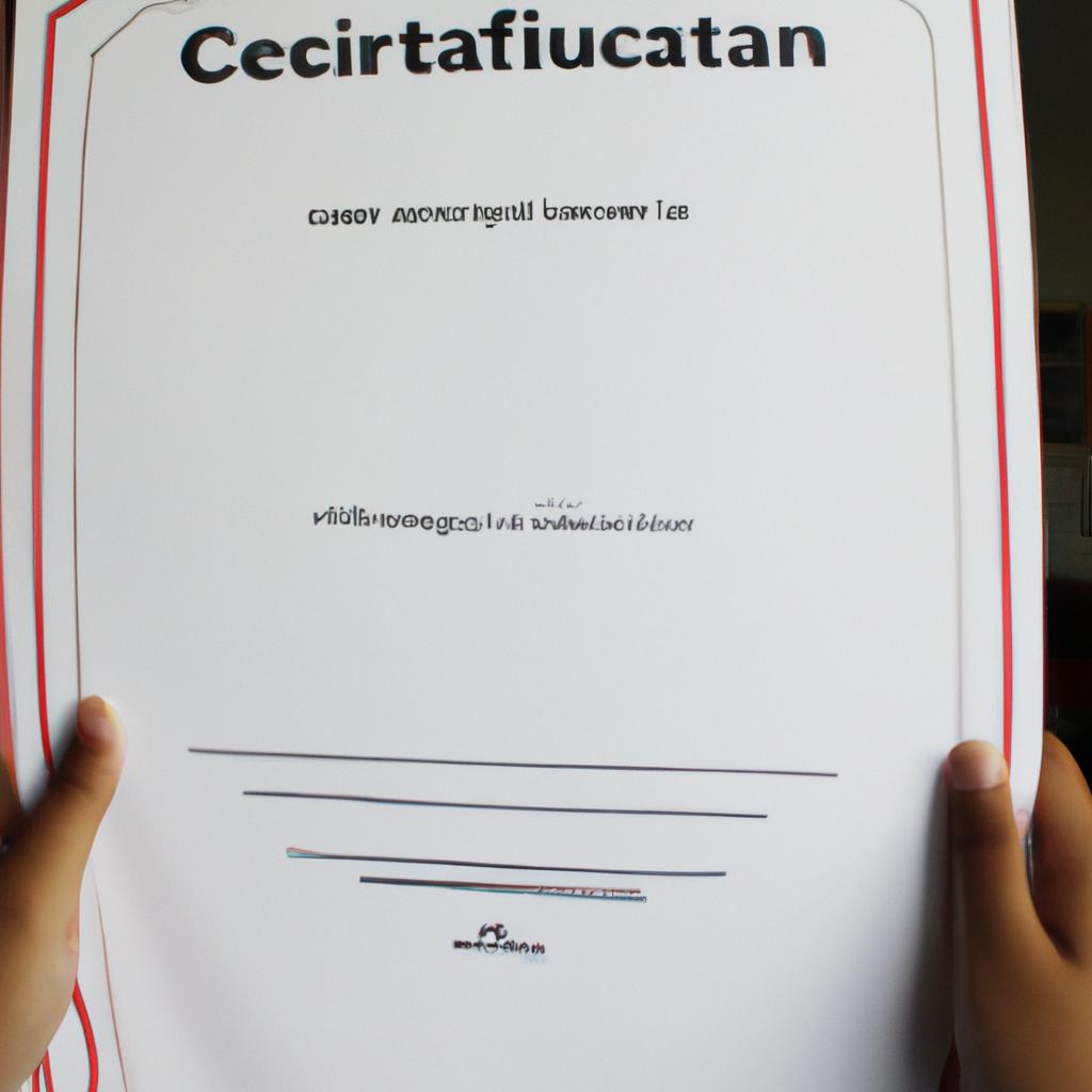 Person holding a scholarship certificate