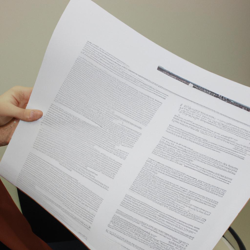 Person holding a research document