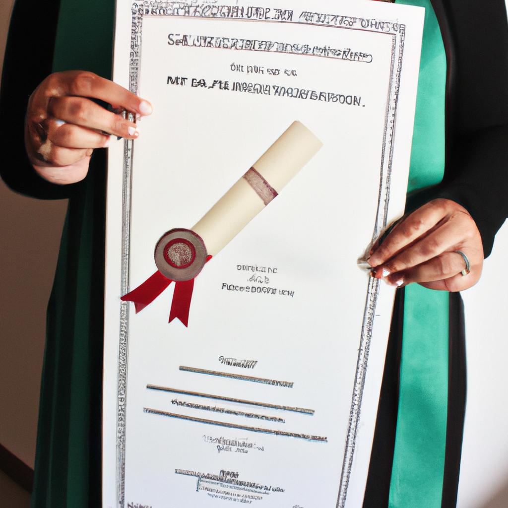 Person holding a graduation certificate